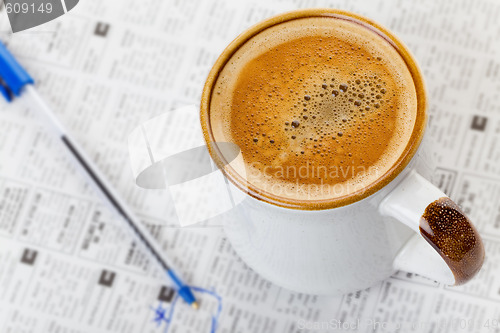 Image of Coffee and newspaper