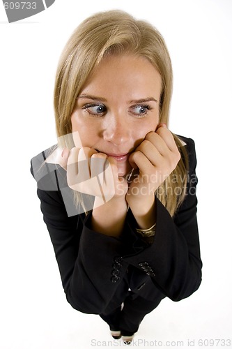 Image of wide angle picture of worried businesswoman