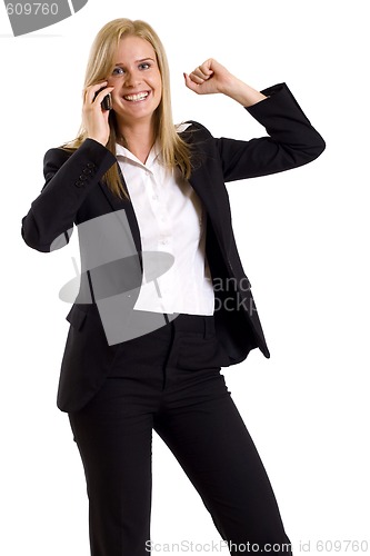 Image of attractive businesswoman on the phone winning