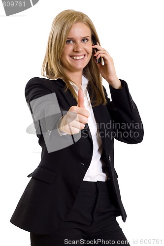 Image of attractive businesswoman on the phone winning