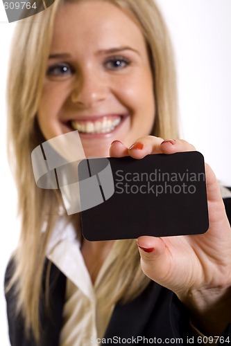 Image of attractive businesswoman holding a blank card