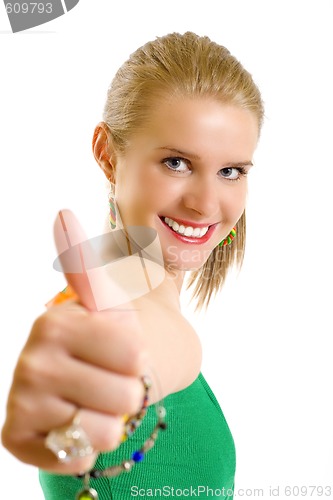 Image of portrait of an attractive young girl making her ok sign