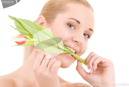 Image of happy woman with flower