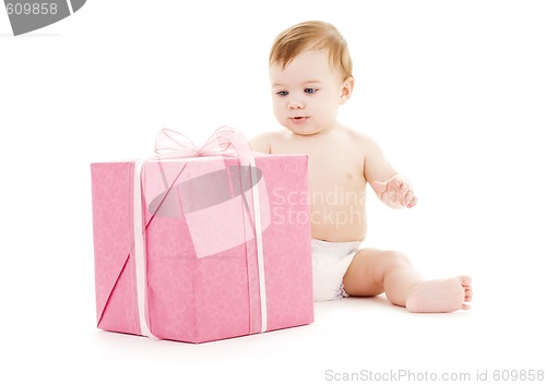 Image of baby boy with big gift box