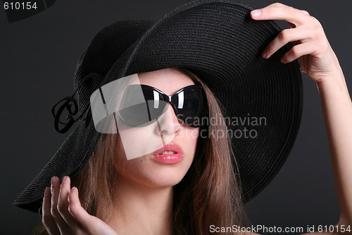 Image of white woman in hat