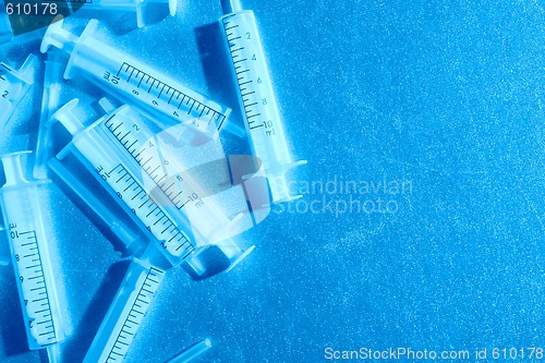 Image of luminous medical syringes