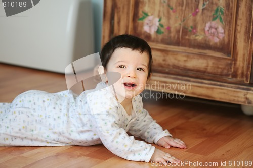 Image of smiling baby, soft focus