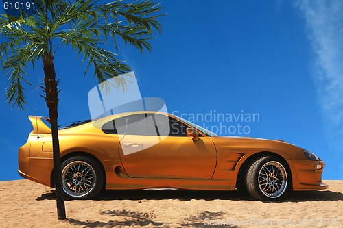 Image of Sport Car on Gold Sand