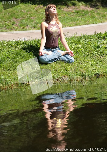 Image of girl on coast of the lake