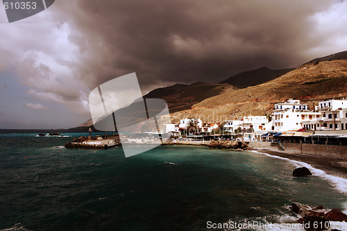 Image of Chora Sfakion under a stormy sky