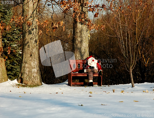 Image of Santa on a Red Bench