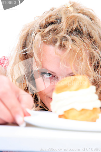 Image of Woman eating cake