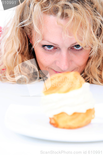 Image of Woman eating cake
