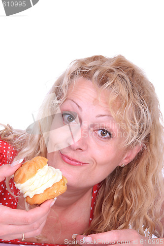 Image of Woman eating cake