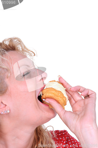 Image of Woman eating cake