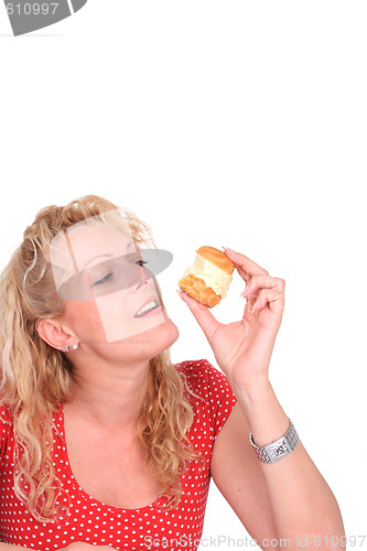 Image of Woman eating cake