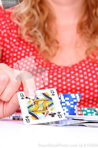 Image of woman playing poker