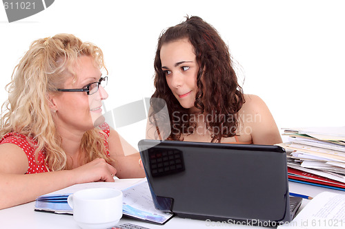 Image of young girl with laptop do homework