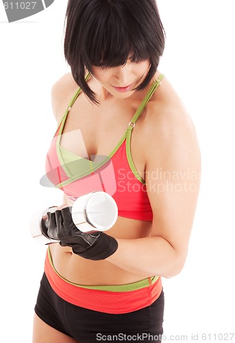 Image of muscular fitness instructor with dumbbells