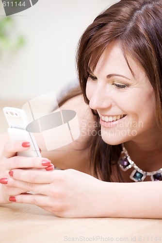 Image of woman with white phone