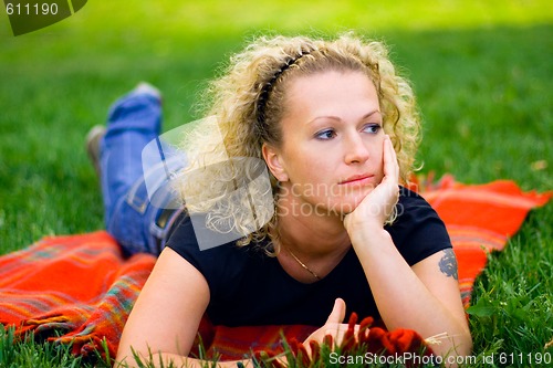 Image of woman on green grass