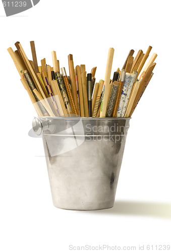 Image of various chopsticks in bucket for champagne