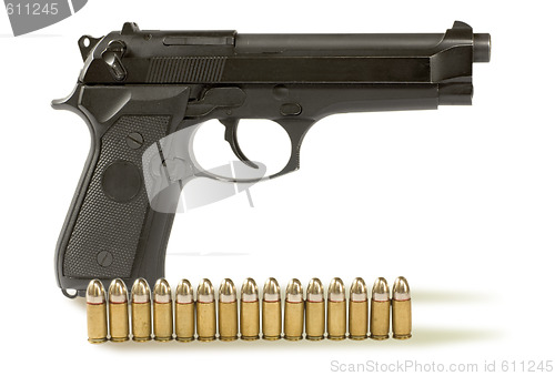 Image of handgun  and 	fifteen bullets