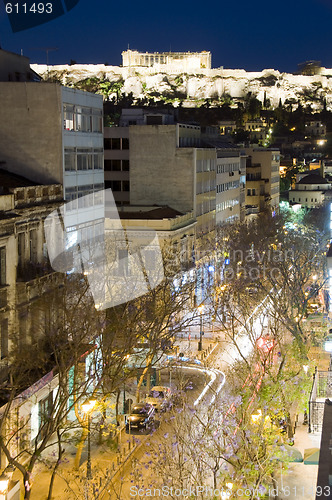 Image of athens greece night scene with parthenon and street car traffic