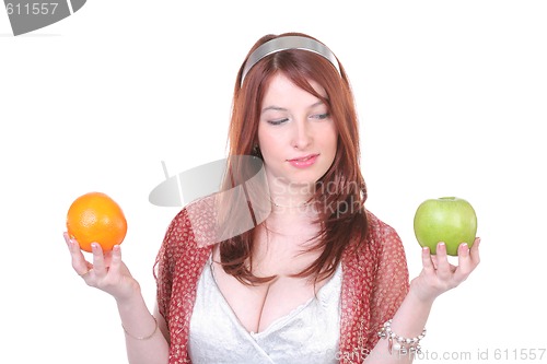 Image of Pretty woman with fruits