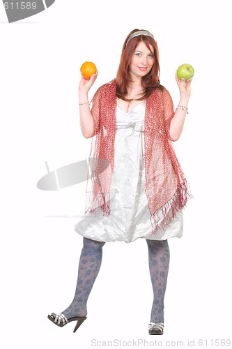 Image of woman with apple and orange