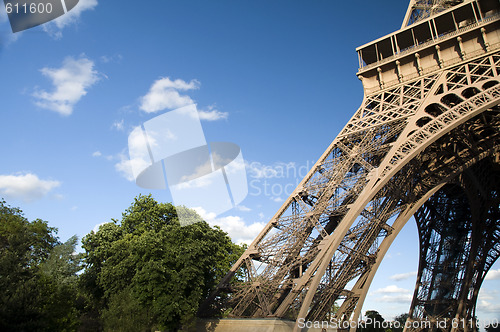 Image of eiffel tower base with trees