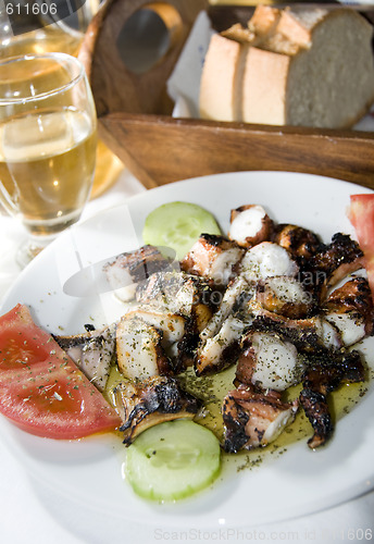 Image of greek island taverna specialty marinated grilled octopus
