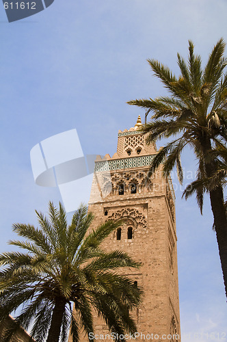 Image of koutubia mosque minaret with palm trees in koutubia gardens marr