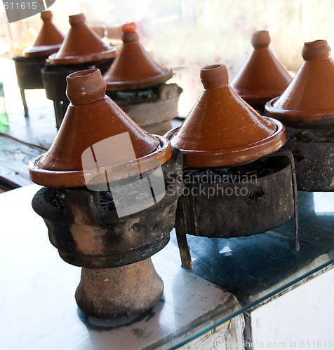 Image of tagines cooking at restaurant in morocco africa