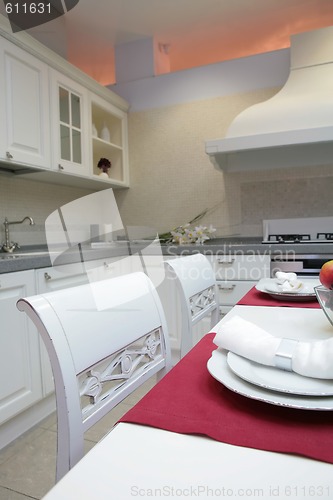 Image of kitchen with white furniture