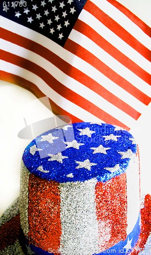 Image of 4th of july hat and US Flag