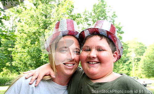 Image of Mother and son in 4th of july hats