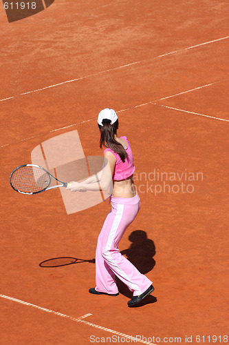 Image of Girl playing tennis