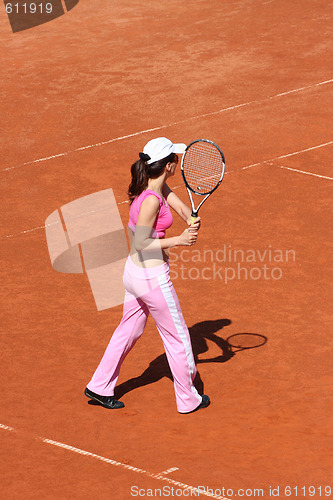 Image of Girl playing tennis