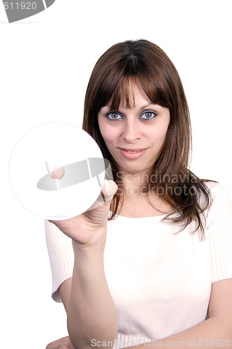 Image of Young beautiful woman holding a cd.