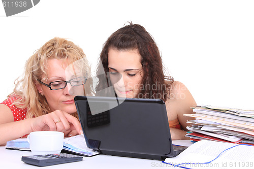 Image of young girl with laptop do homework