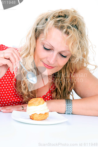 Image of Woman eating cake