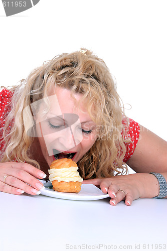 Image of Woman eating cake