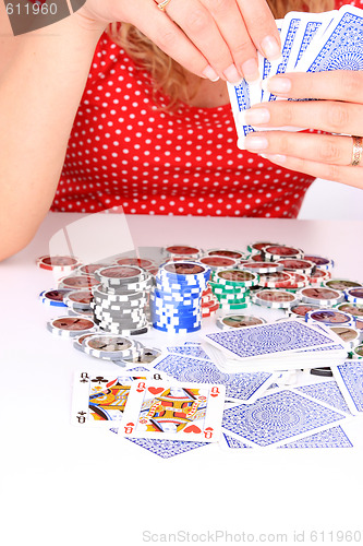 Image of woman playing poker