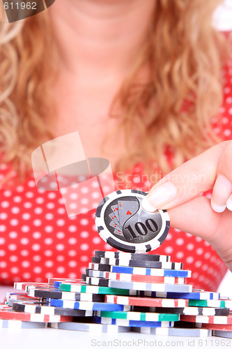 Image of woman playing poker