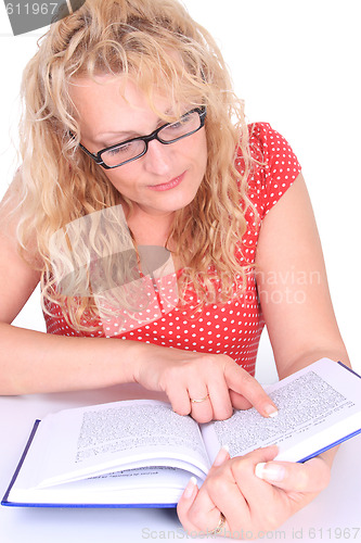 Image of Young  woman reading