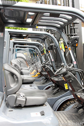 Image of Forklifters in line