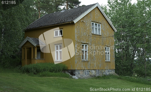 Image of Yellow wooden house.