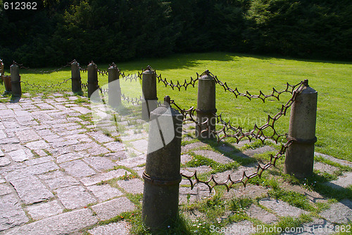 Image of Metal fence with stone columns