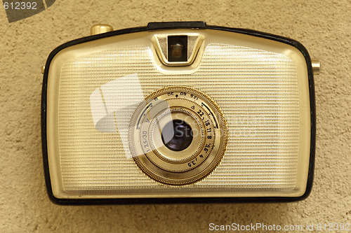 Image of Golden retro photo camera